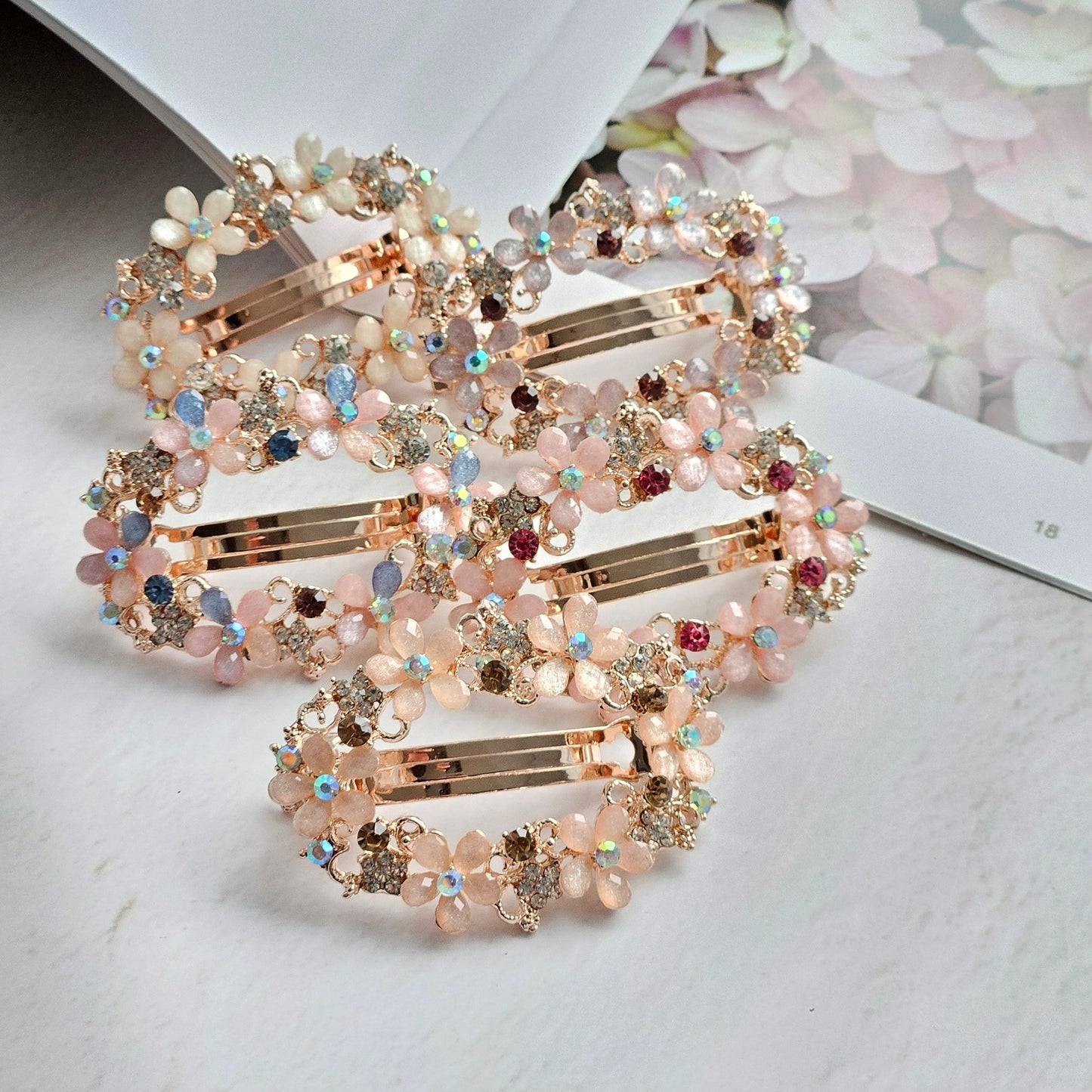 Radiant Rose Elegance: Rose Gold Hair Clip Adorned with Faux Diamonds and Delicate Flowers Introducing a touch of brilliance!