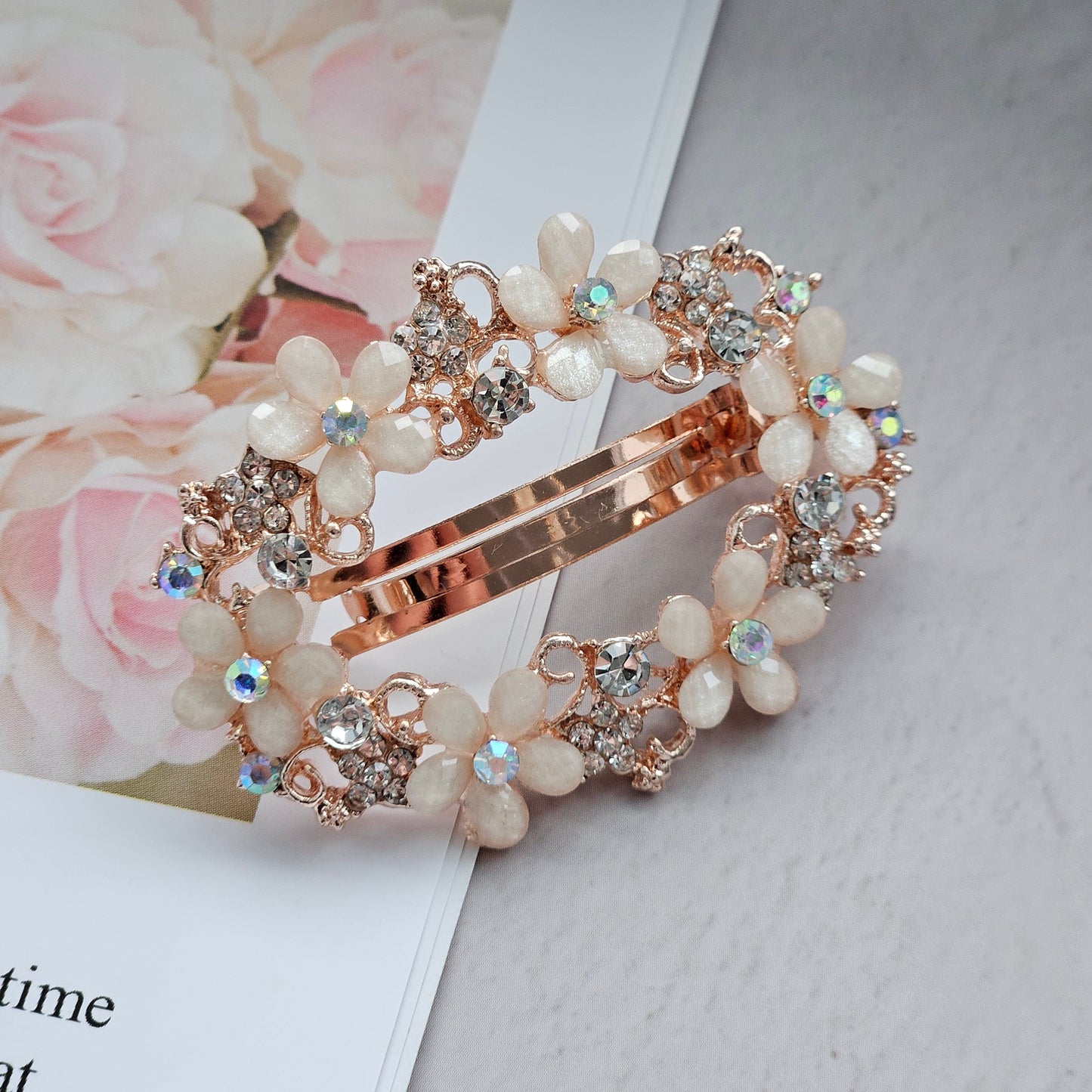 Radiant Rose Elegance: Rose Gold Hair Clip Adorned with Faux Diamonds and Delicate Flowers Introducing a touch of brilliance!