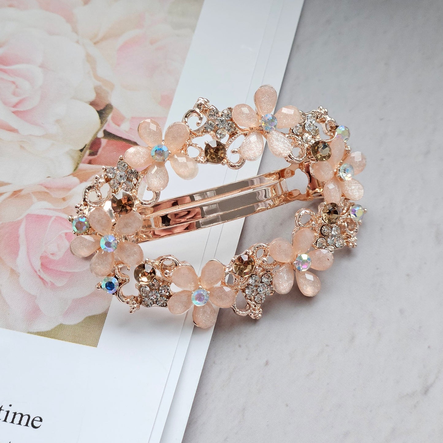 Radiant Rose Elegance: Rose Gold Hair Clip Adorned with Faux Diamonds and Delicate Flowers Introducing a touch of brilliance!